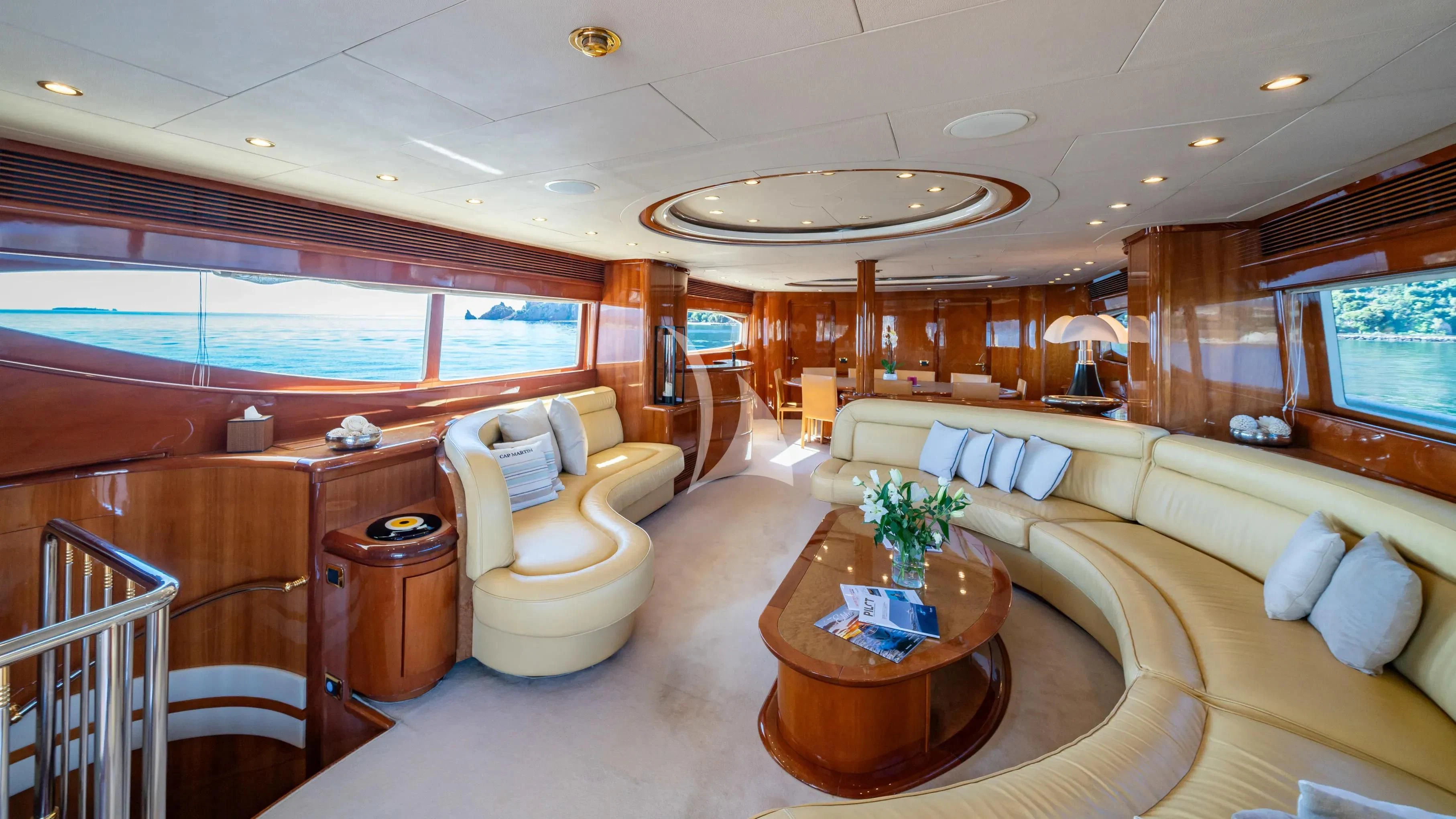 a living room with a large window aboard BEIJA FLORE Yacht for Charter