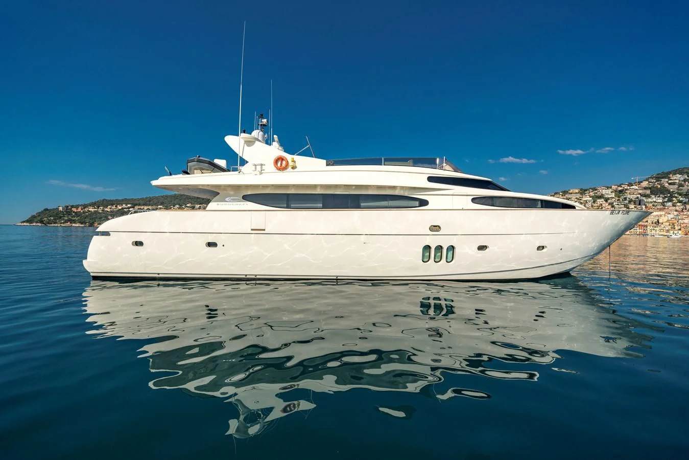 a white yacht on the water aboard BEIJA FLORE Yacht for Charter
