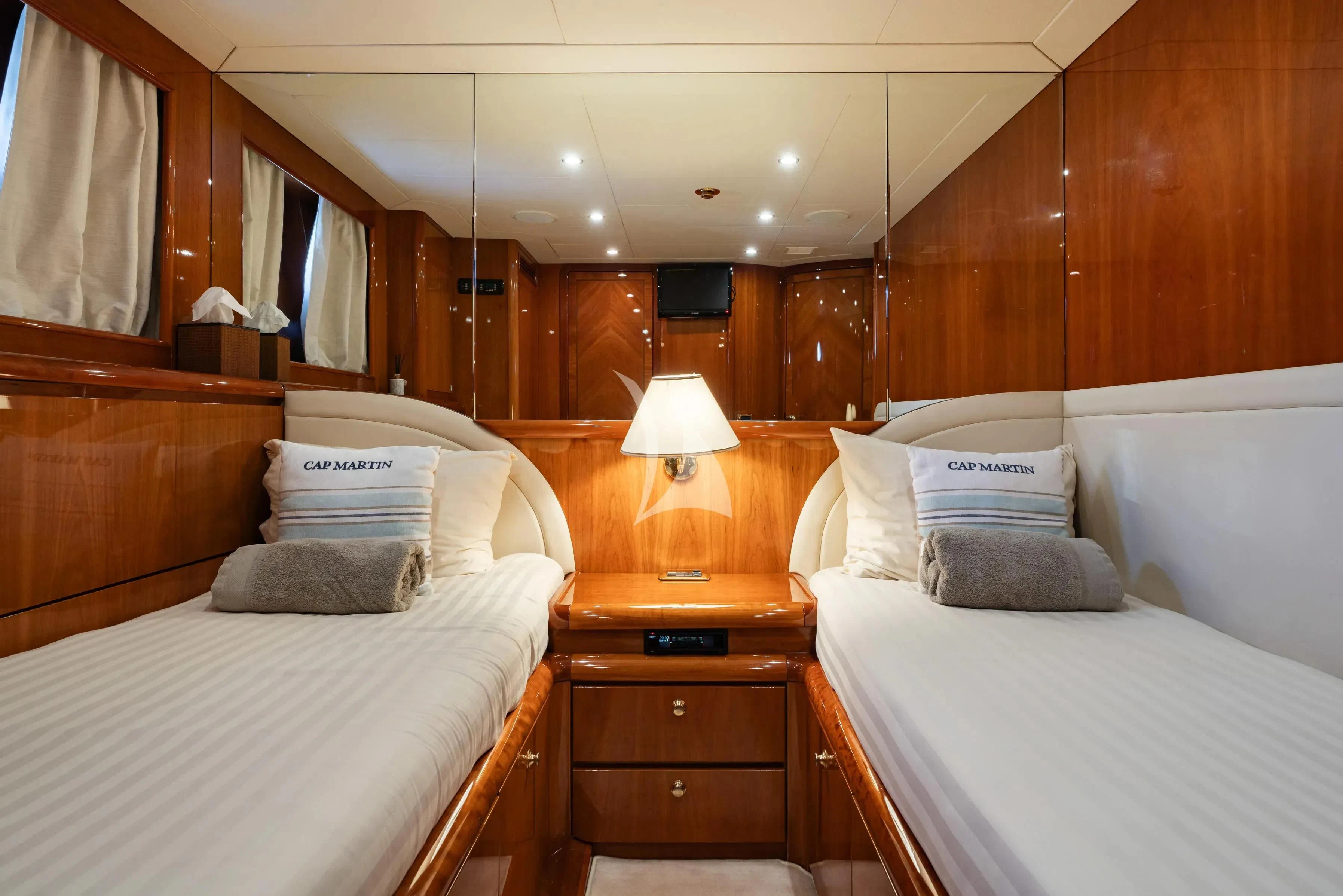 a couple of beds in a cabin aboard BEIJA FLORE Yacht for Charter