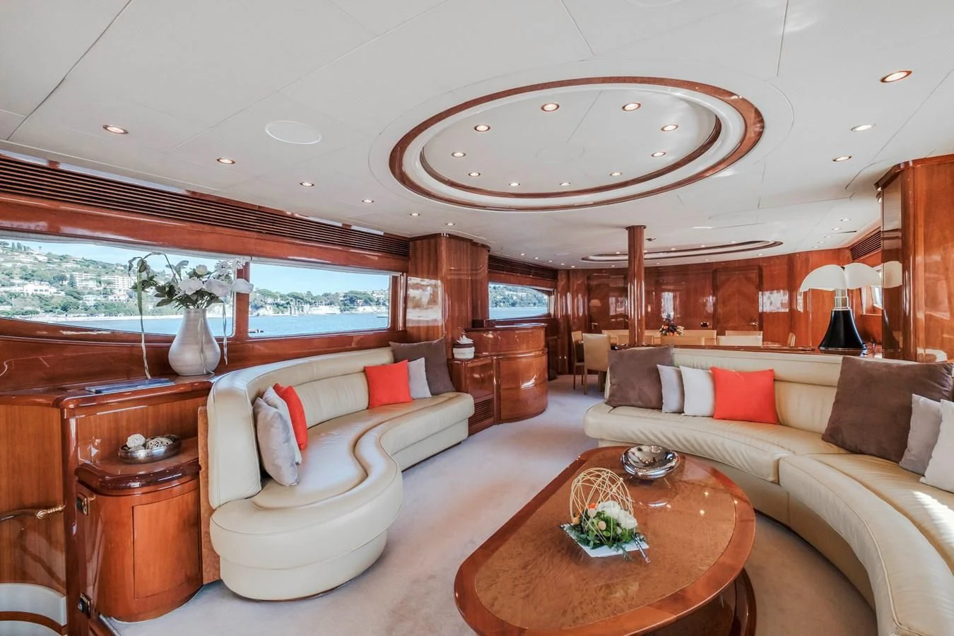 a living room with a large window aboard BEIJA FLORE Yacht for Charter