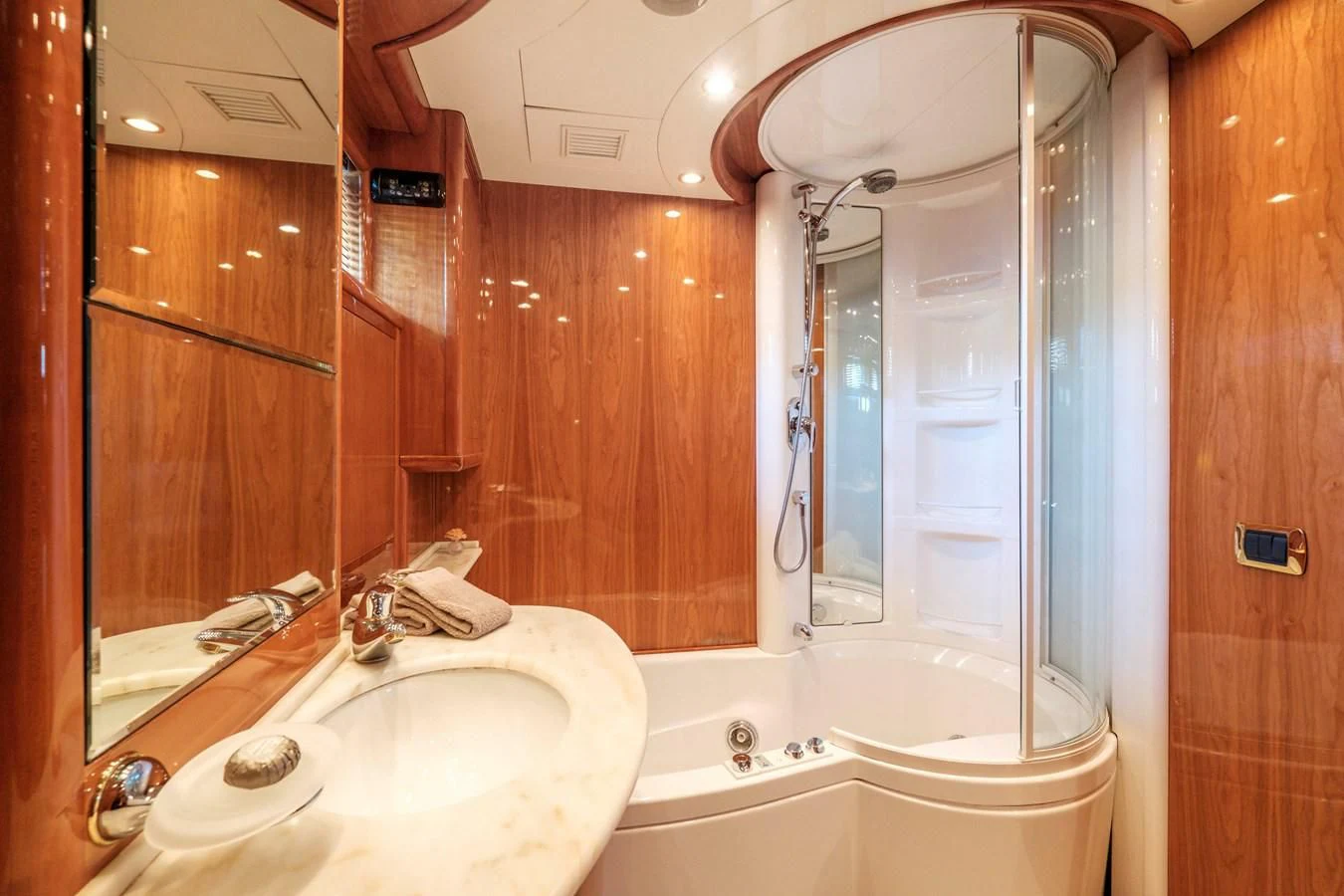 a bathroom with a shower and sink aboard BEIJA FLORE Yacht for Charter