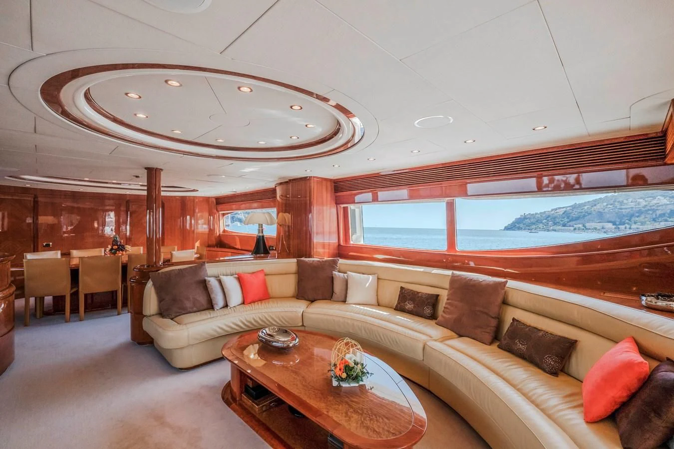 a living room with a large window aboard BEIJA FLORE Yacht for Charter
