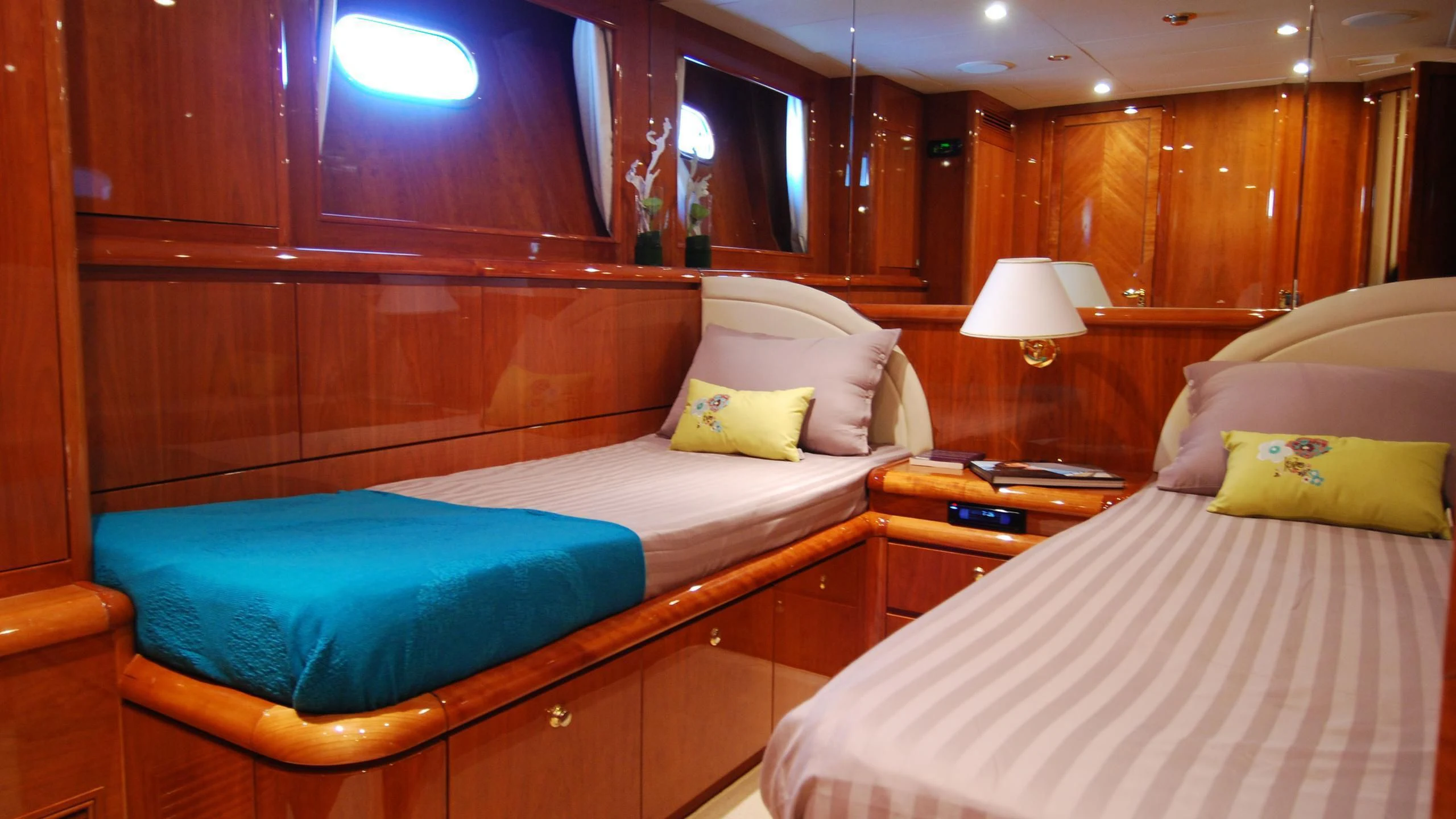 a couple of beds in a room aboard BEIJA FLORE Yacht for Charter