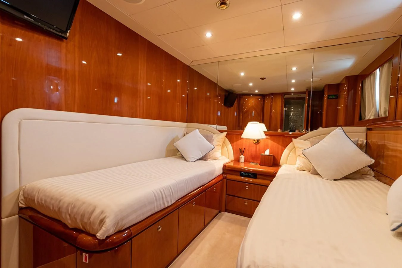 a room with two beds aboard BEIJA FLORE Yacht for Charter