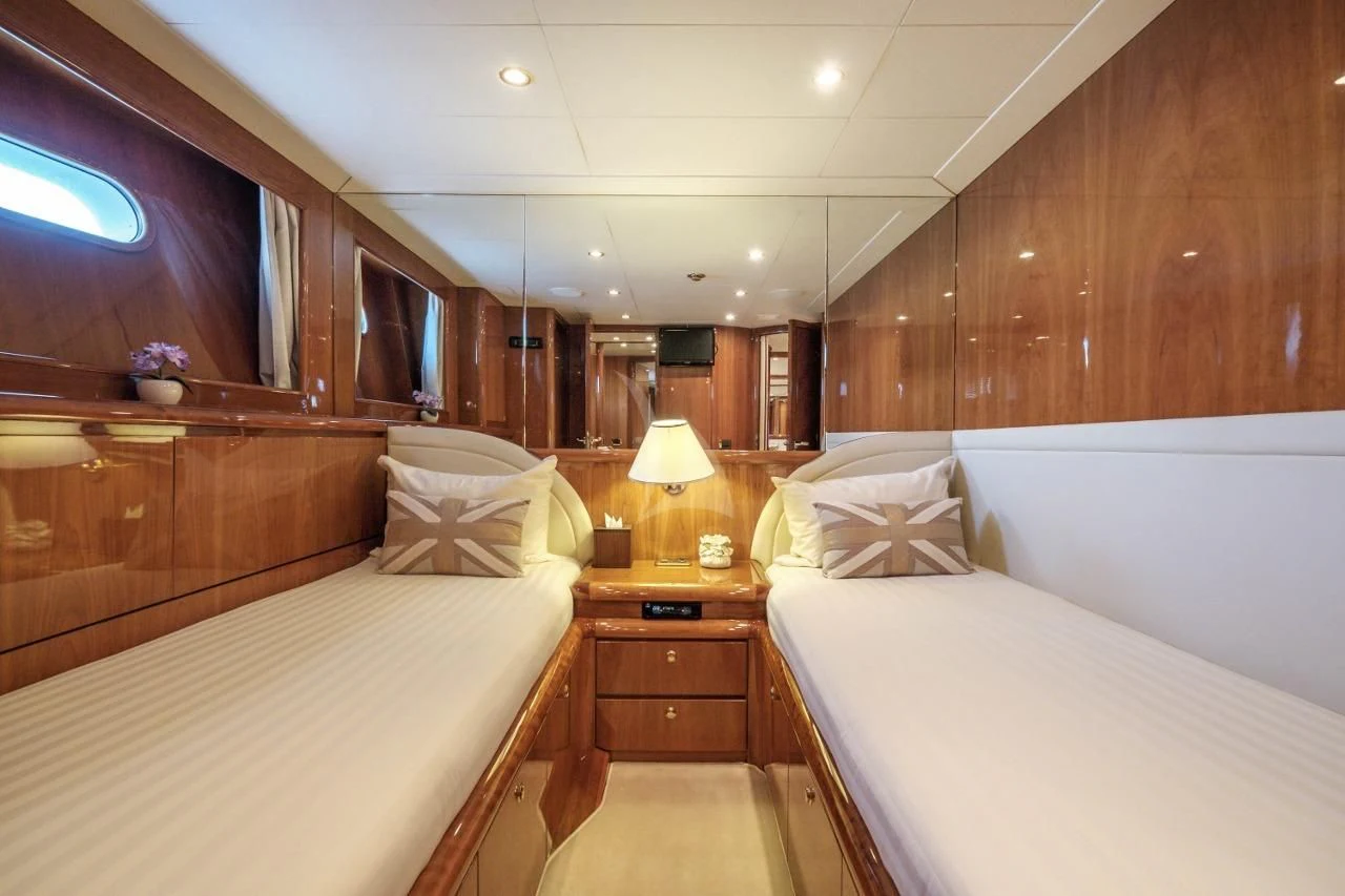 a room with two beds aboard BEIJA FLORE Yacht for Charter