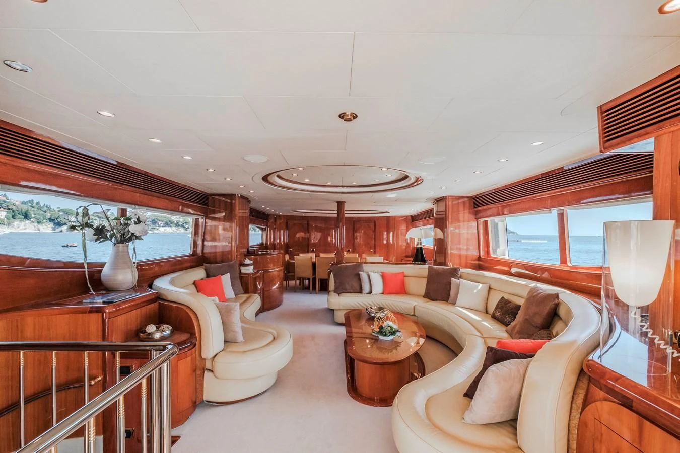 a living room with a large window aboard BEIJA FLORE Yacht for Charter