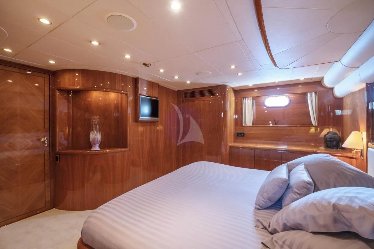 a bed in a cabin aboard BEIJA FLORE Yacht for Charter
