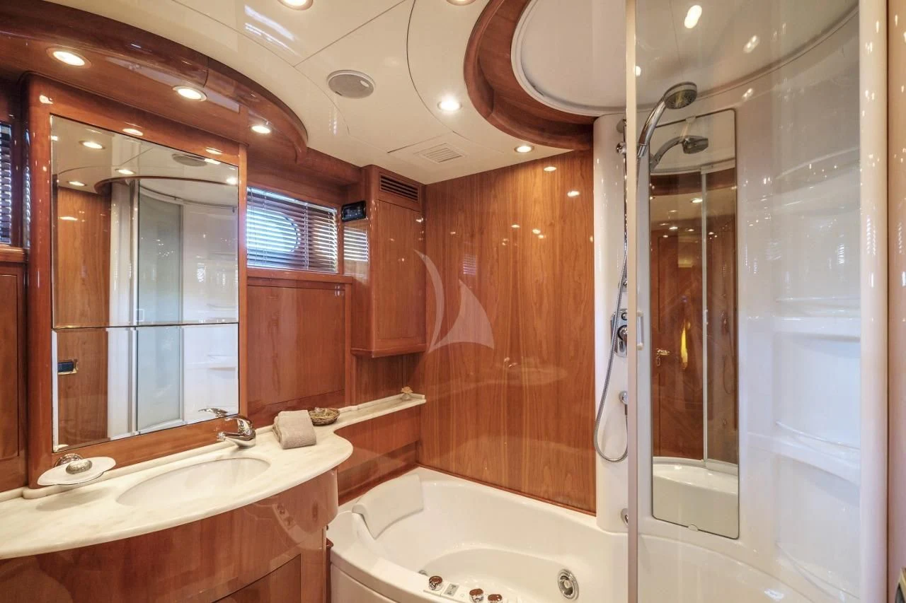 a bathroom with a bathtub and sink aboard BEIJA FLORE Yacht for Charter