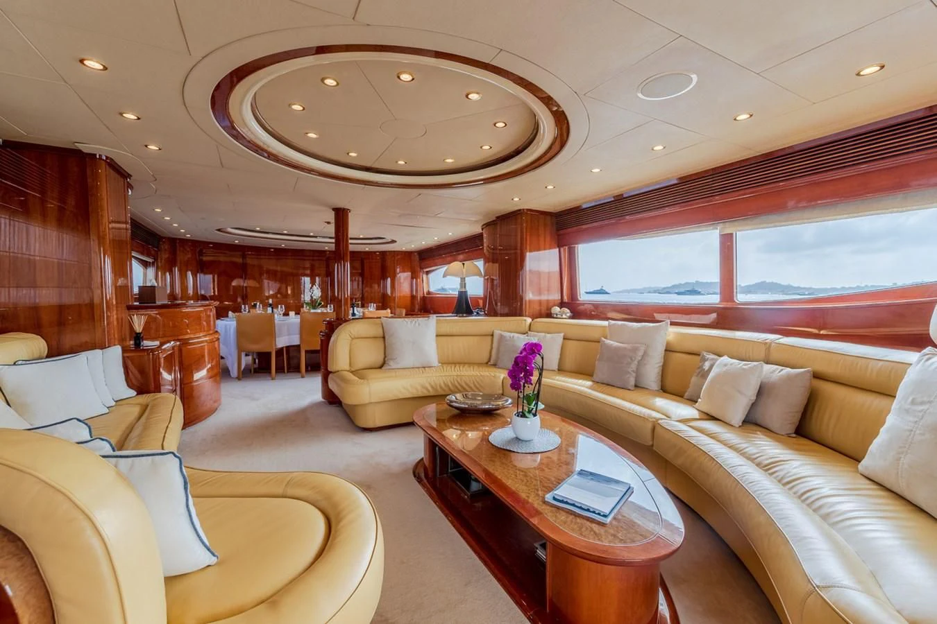 a living room with a large window aboard BEIJA FLORE Yacht for Charter