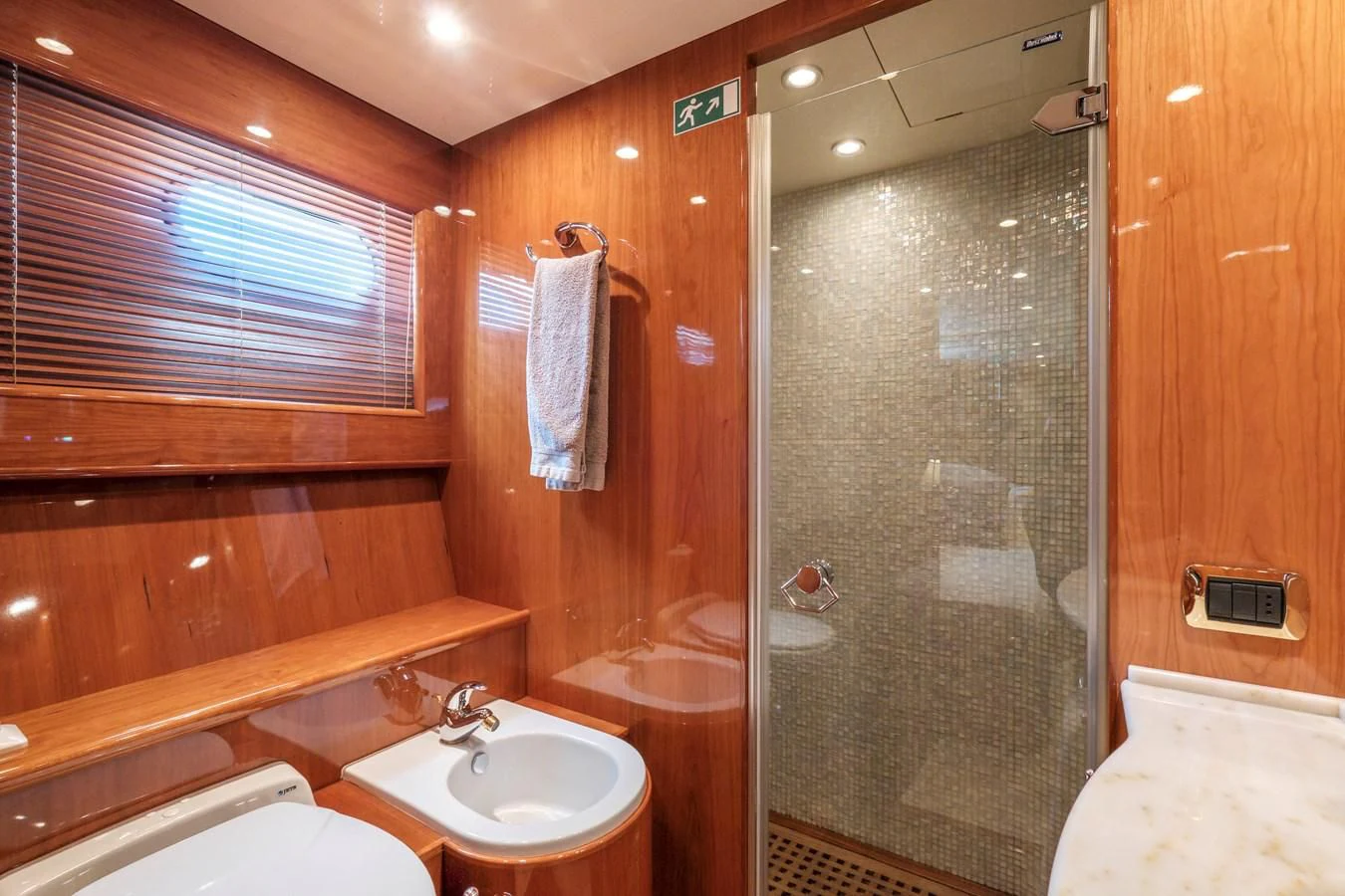 a bathroom with a shower and sink aboard BEIJA FLORE Yacht for Charter