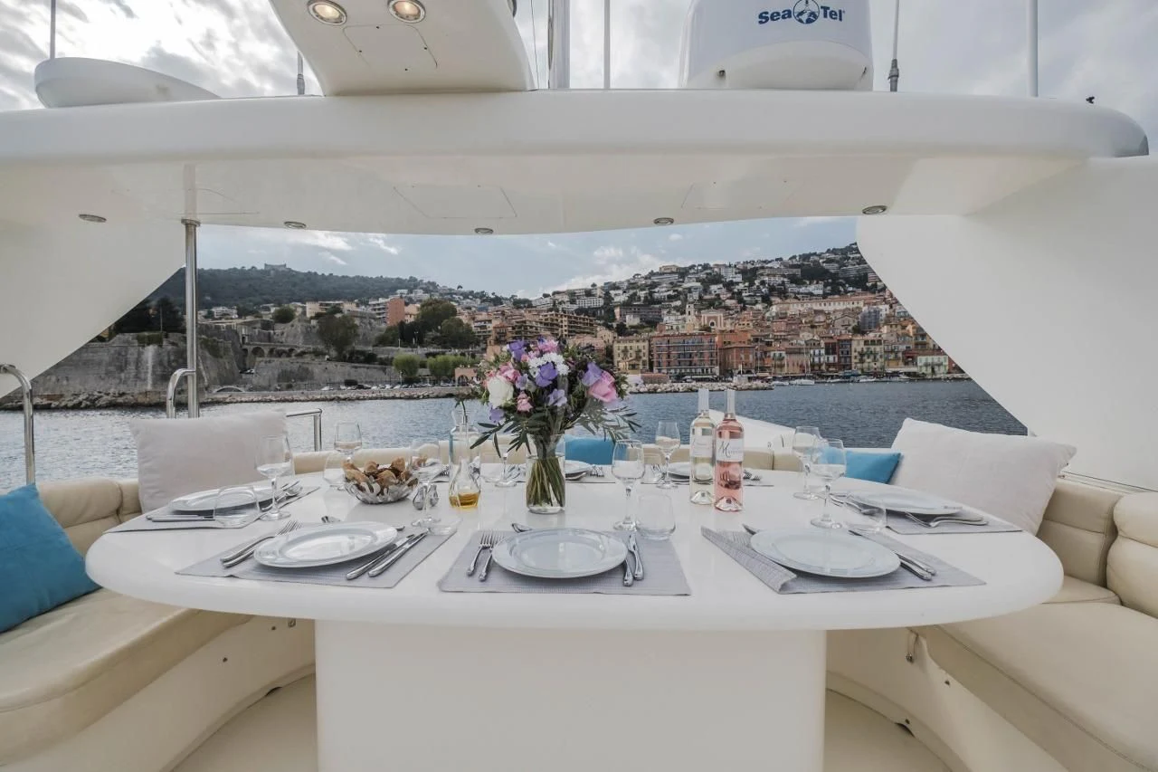 a table set for a dinner aboard BEIJA FLORE Yacht for Charter