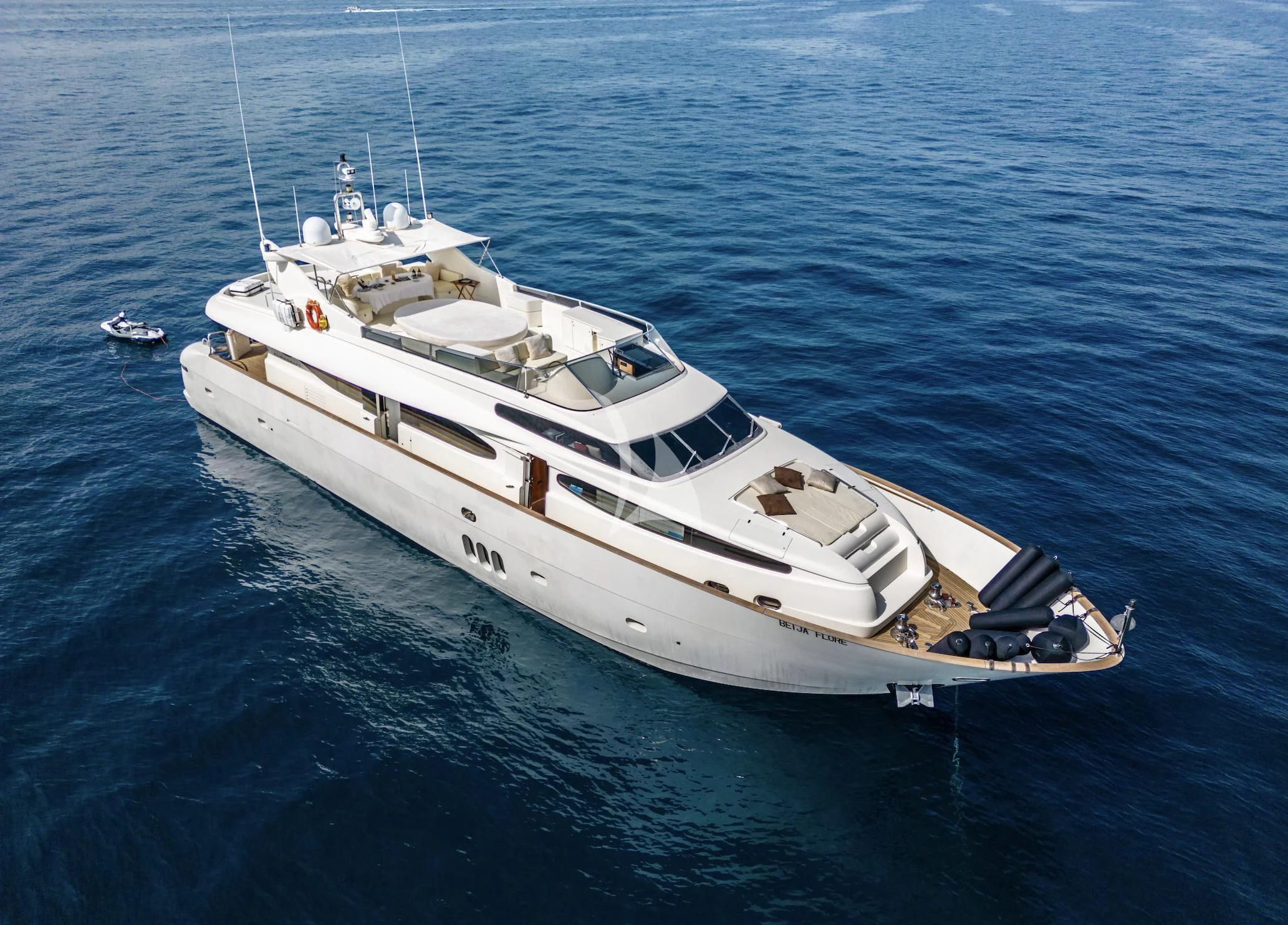 a white yacht in the water aboard BEIJA FLORE Yacht for Charter