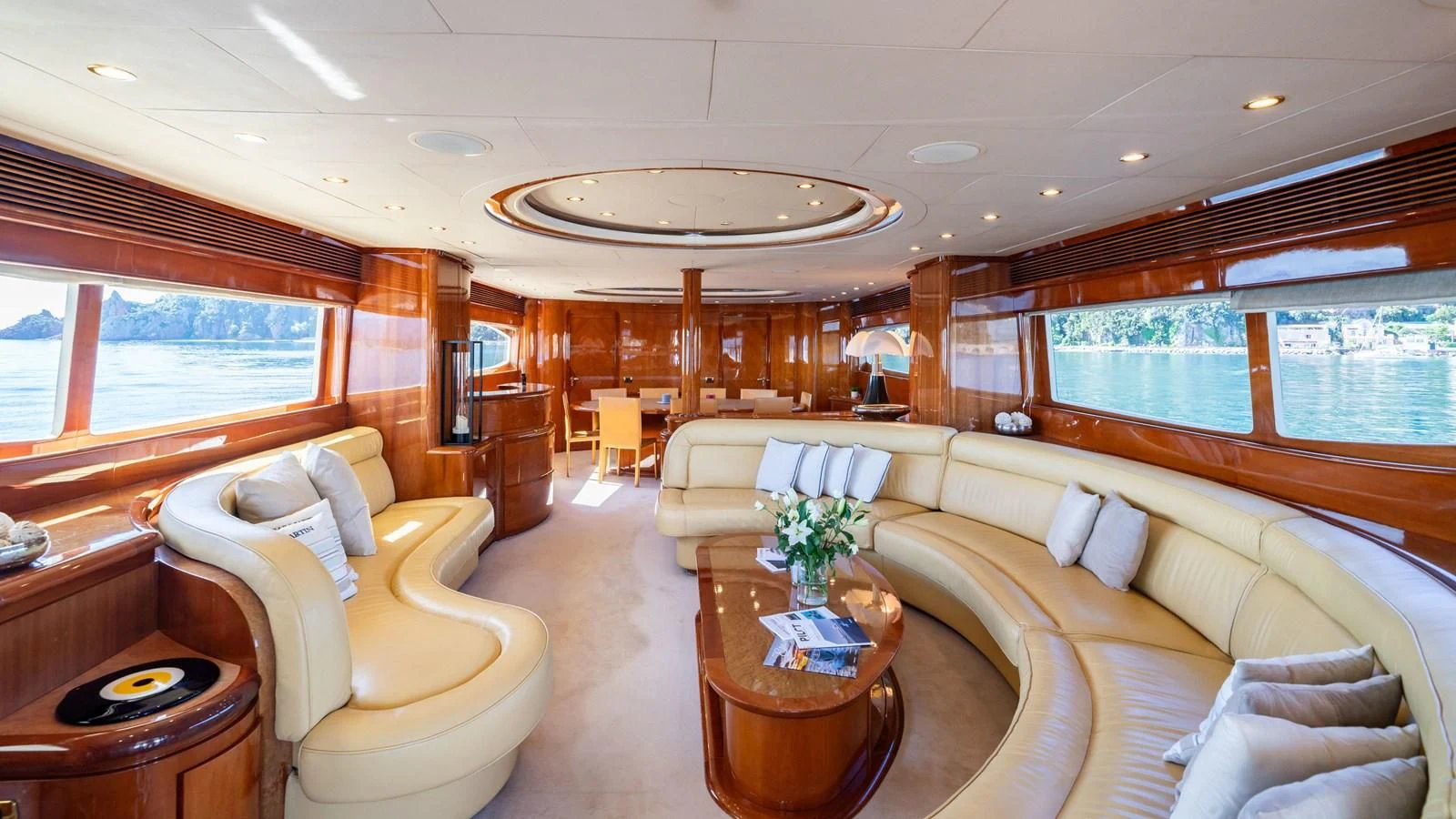 a living room with a large window aboard BEIJA FLORE Yacht for Charter