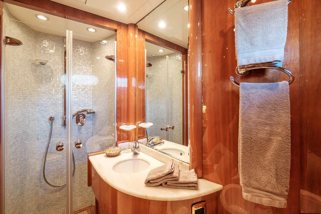 a bathroom with a shower and sink aboard BEIJA FLORE Yacht for Charter