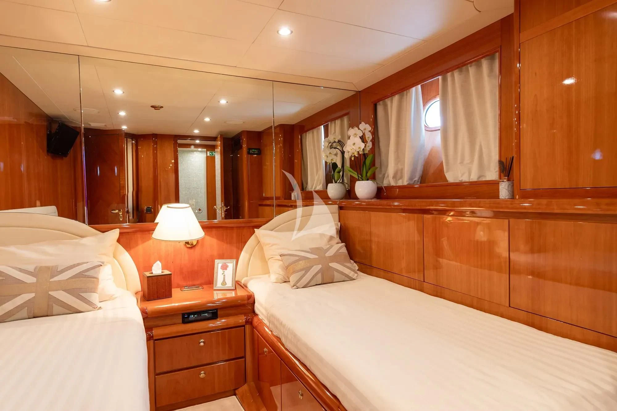a room with two beds aboard BEIJA FLORE Yacht for Charter