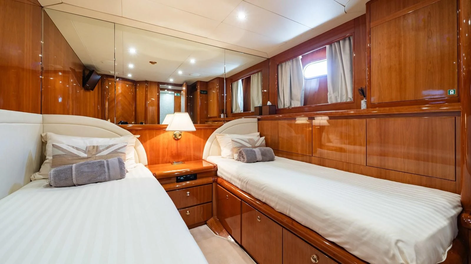 a room with two beds aboard BEIJA FLORE Yacht for Charter