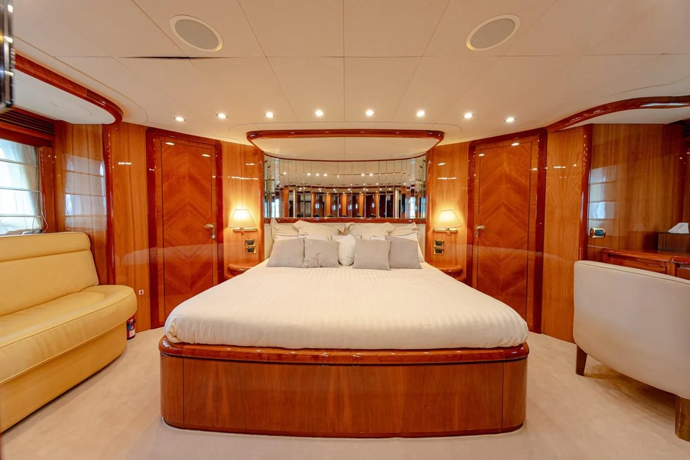 a large bed in a room aboard BEIJA FLORE Yacht for Charter