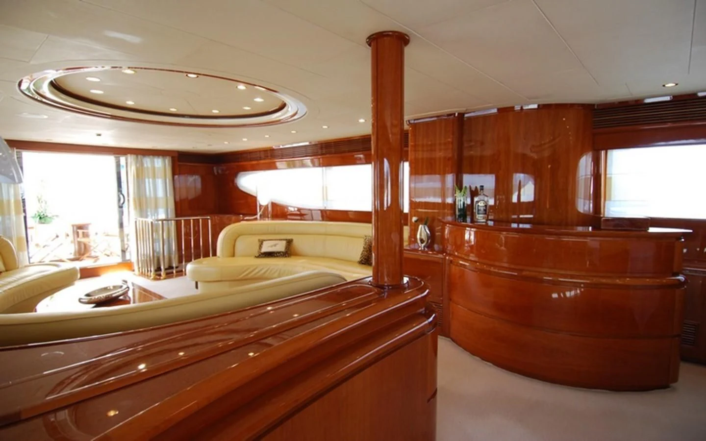 a room with a bed and a desk aboard BEIJA FLORE Yacht for Charter