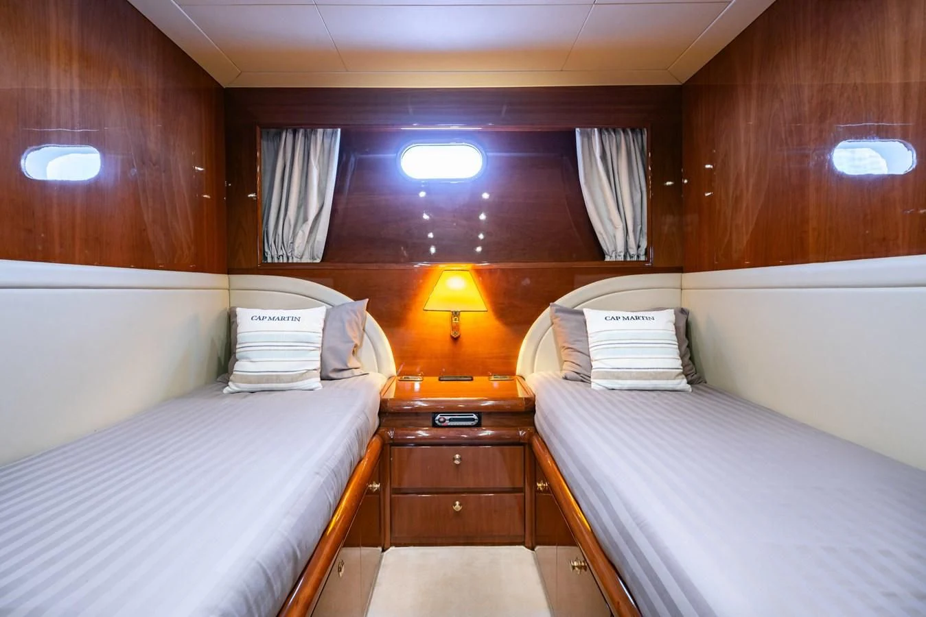 a couple of beds in a room aboard BEIJA FLORE Yacht for Charter