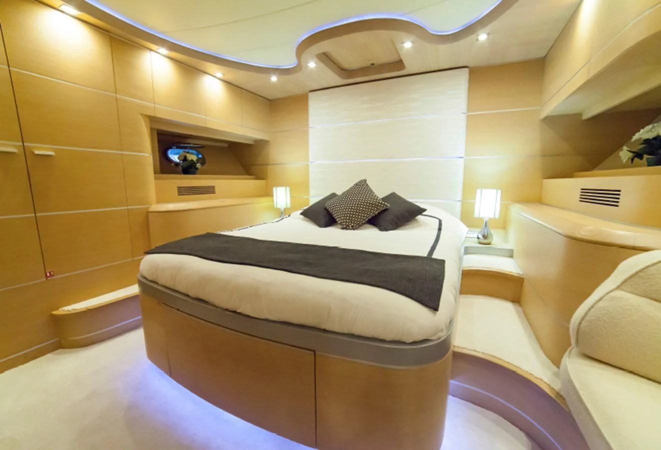 a bed in a room aboard KOKAB Yacht for Charter