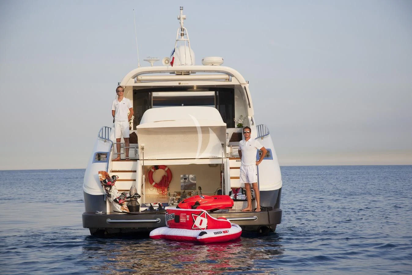 a couple of men on a boat aboard KOKAB Yacht for Charter