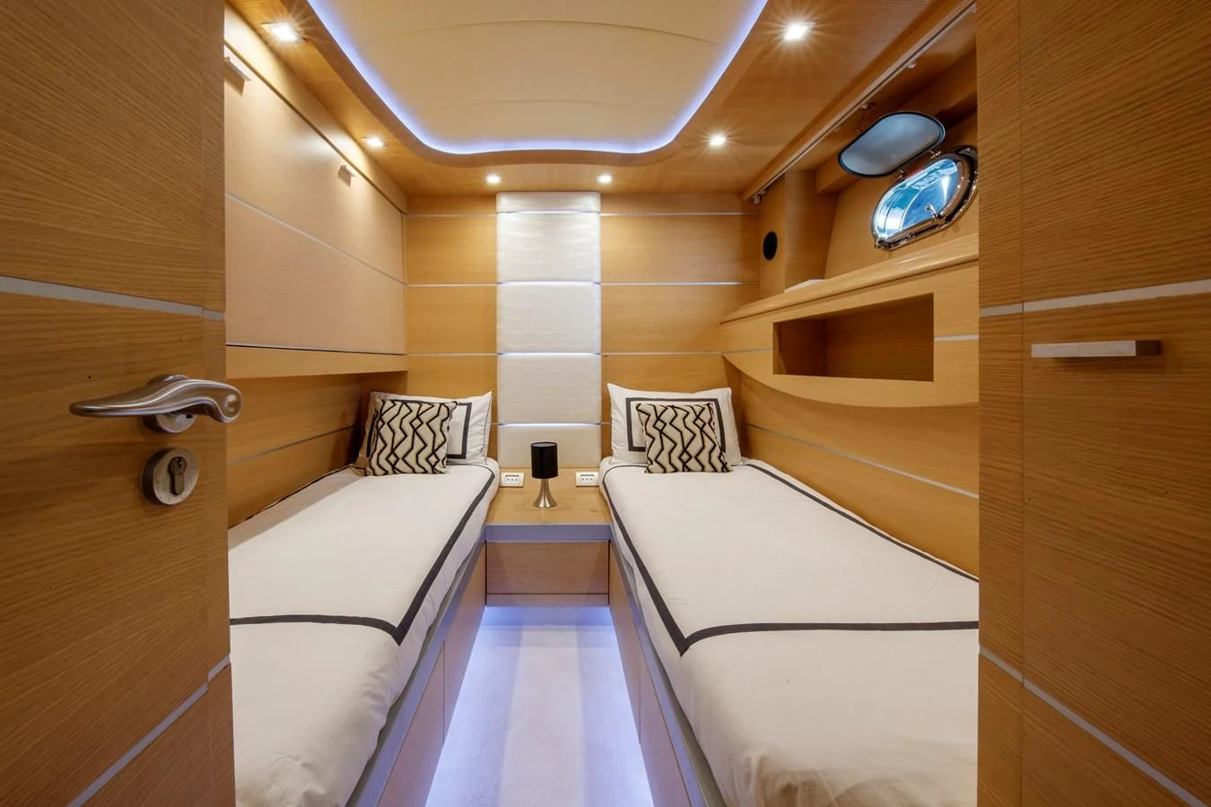 a room with two beds aboard KOKAB Yacht for Charter