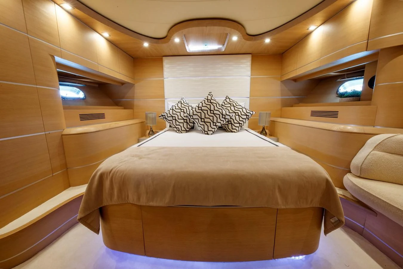 a bed in a room aboard KOKAB Yacht for Charter