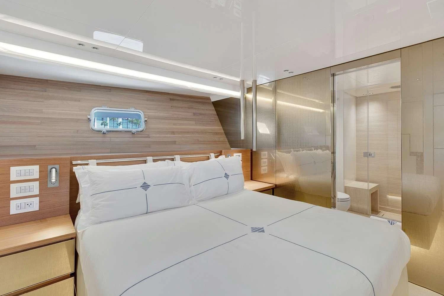 a room with a bed and a desk aboard SWEET VIRGINIA Yacht for Sale