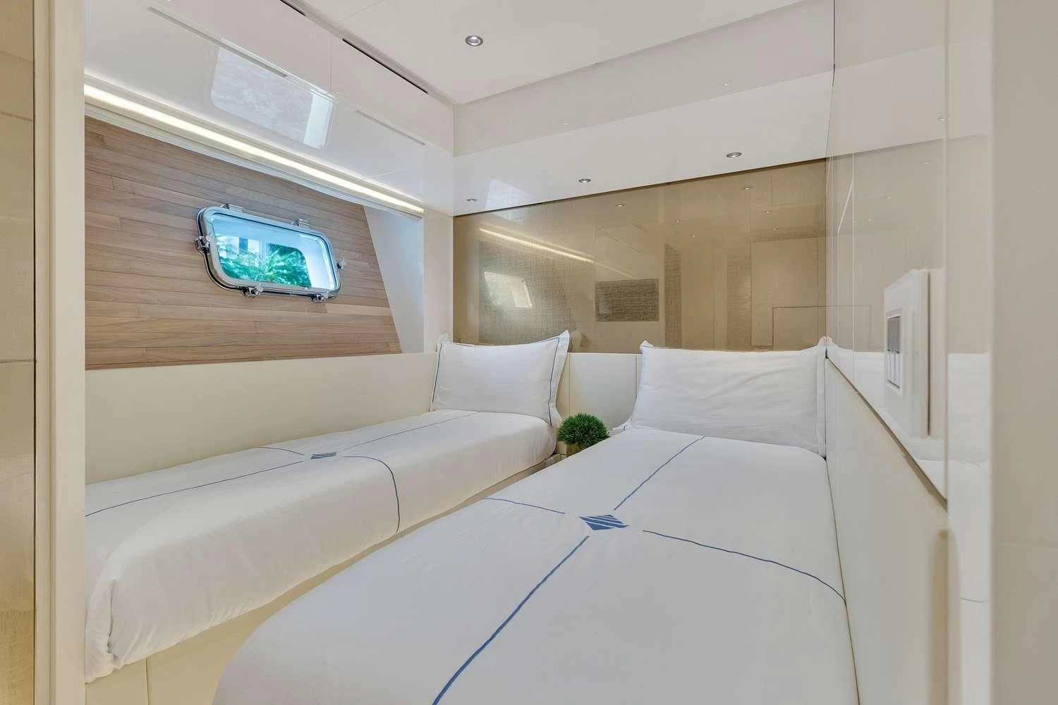 a room with white beds aboard SWEET VIRGINIA Yacht for Sale