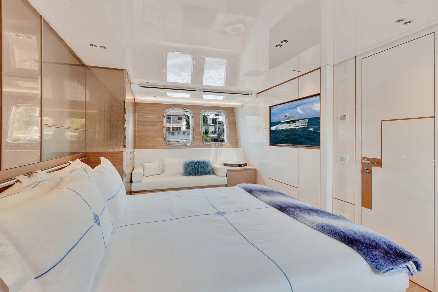 a room with a bed and a tv aboard SWEET VIRGINIA Yacht for Sale