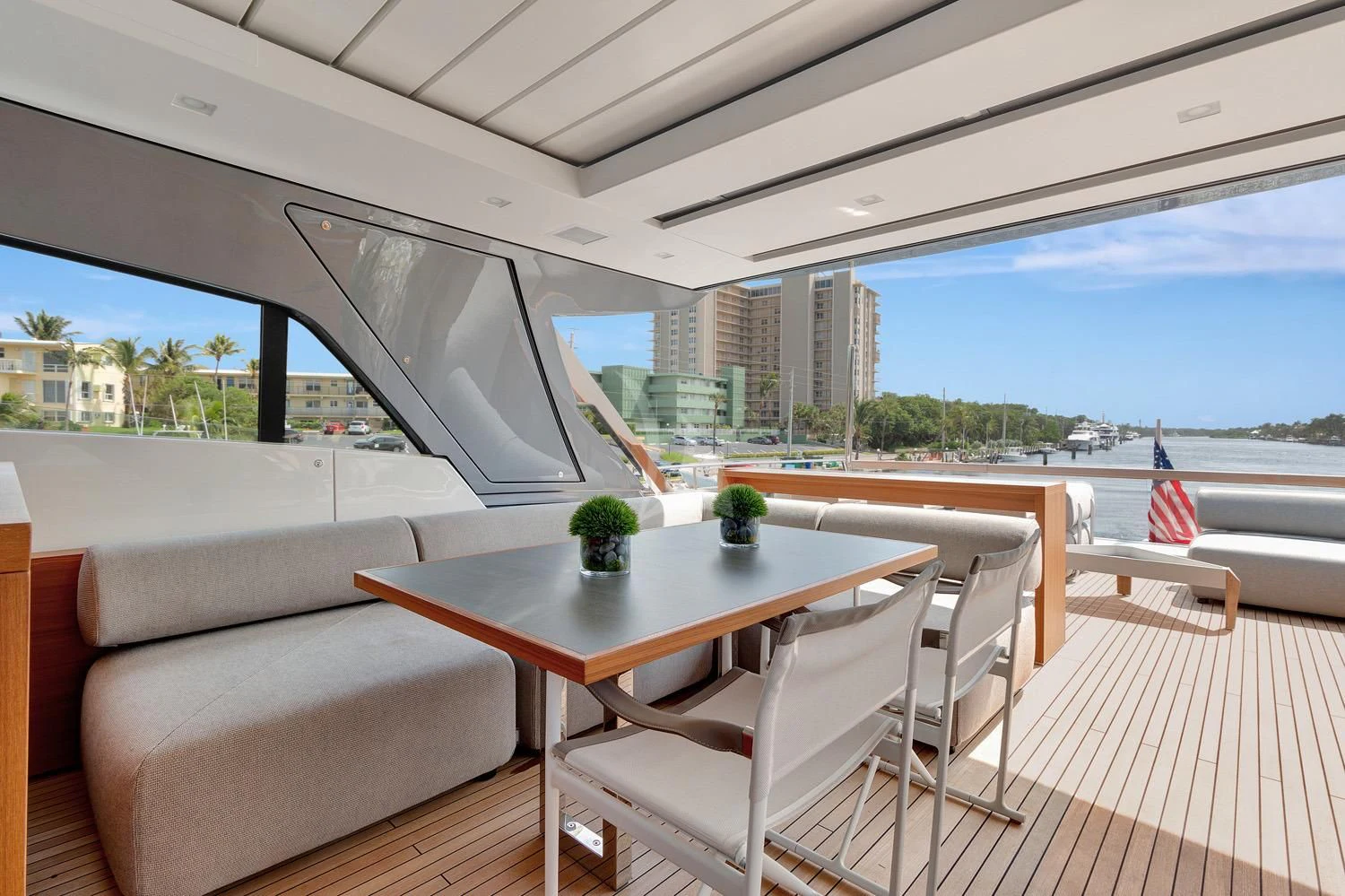 a table and chairs on a deck aboard SWEET VIRGINIA Yacht for Sale