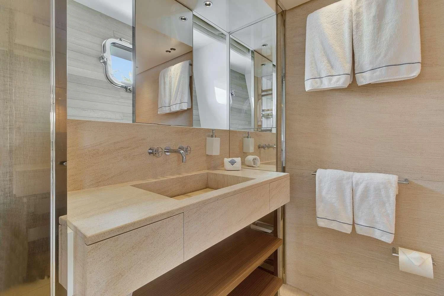 a bathroom with a large mirror aboard SWEET VIRGINIA Yacht for Sale