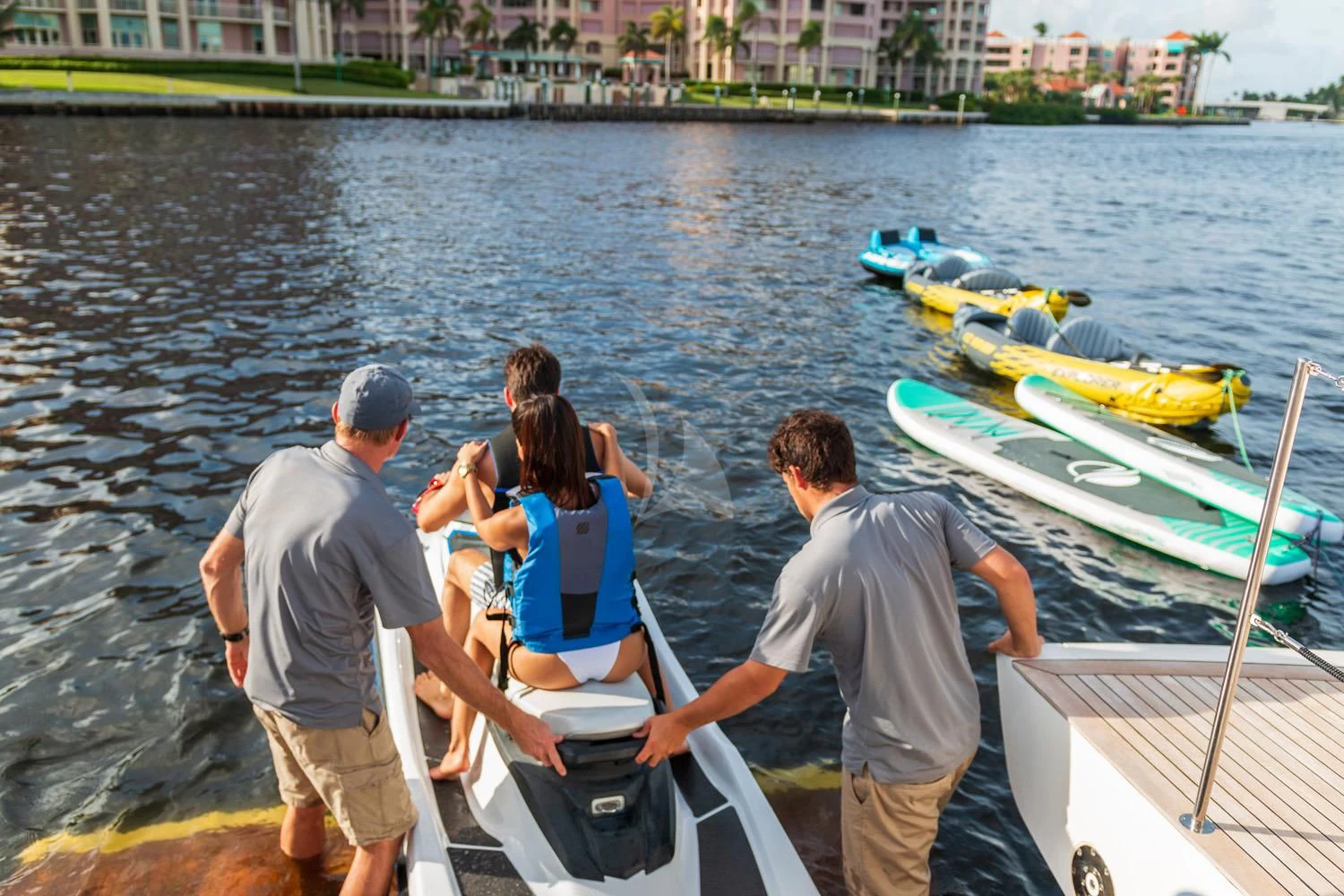 a group of people standing on a boat in the water aboard SWEET VIRGINIA Yacht for Sale