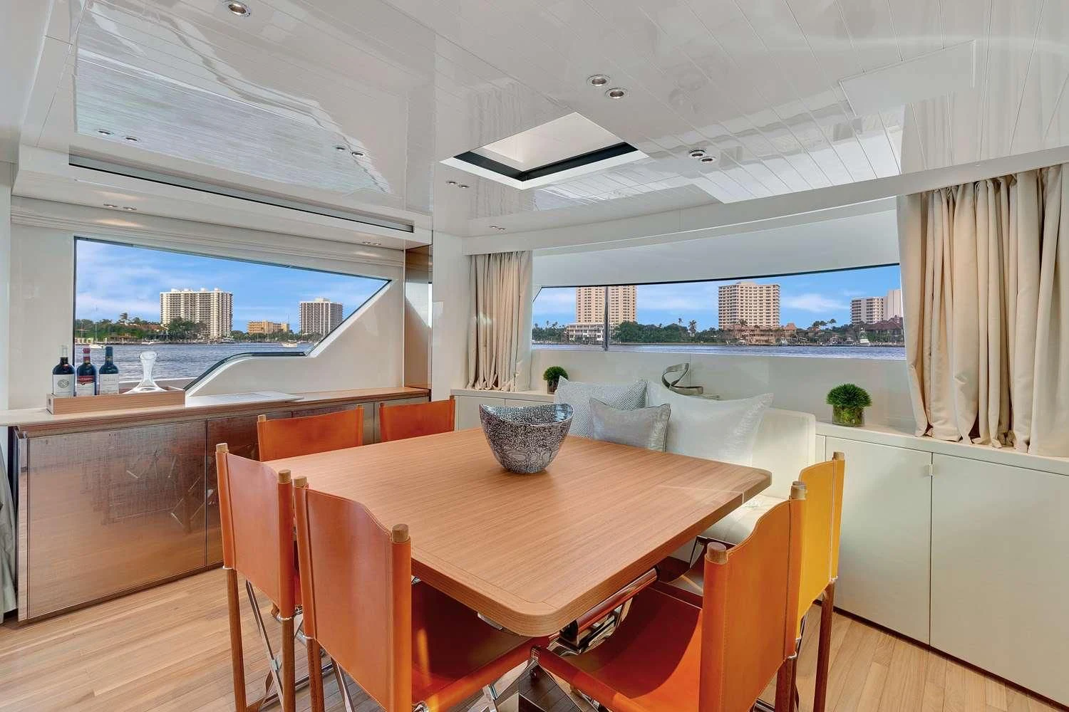 a room with a table and chairs aboard SWEET VIRGINIA Yacht for Sale