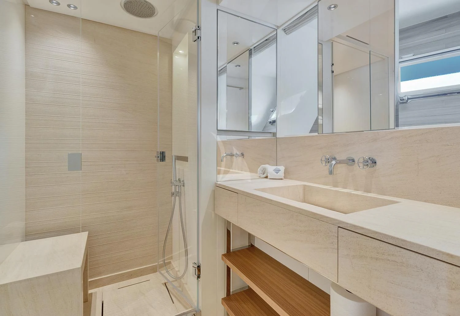 a bathroom with a sink and a mirror aboard SWEET VIRGINIA Yacht for Sale