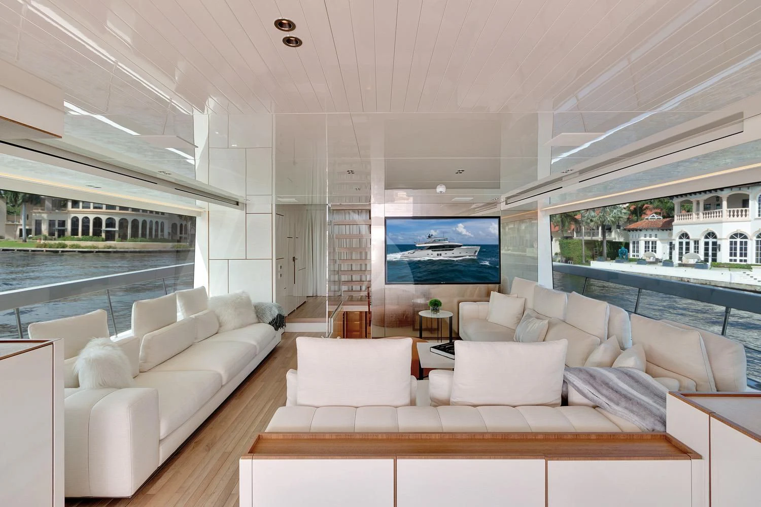 a living room with a large window aboard SWEET VIRGINIA Yacht for Sale