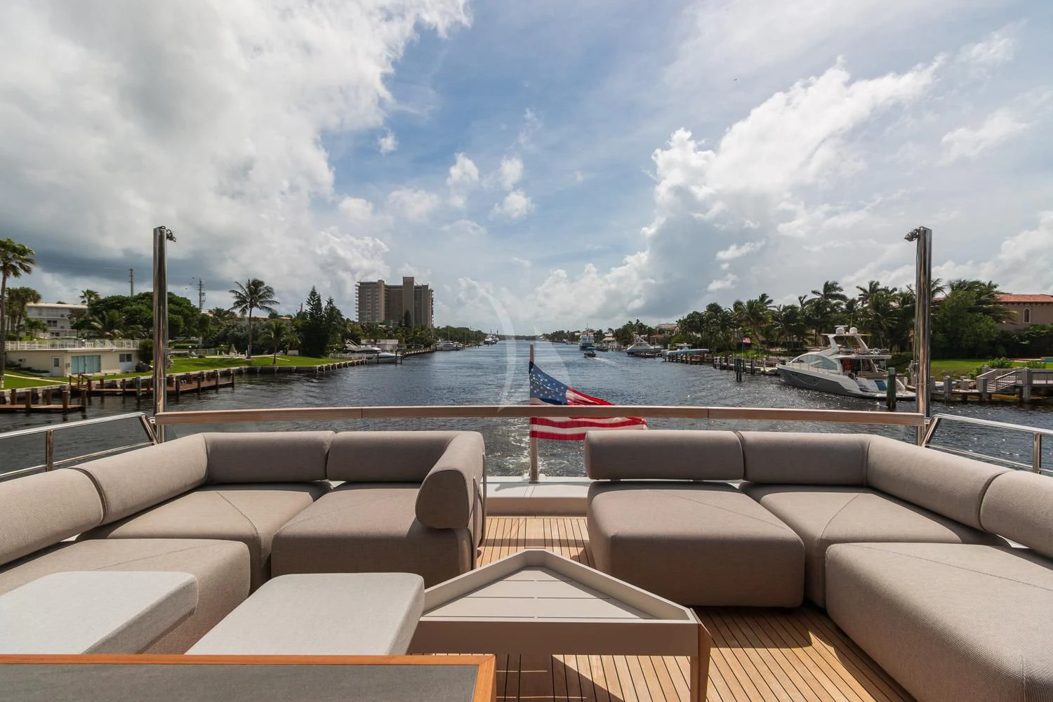 a pool with chairs and a beach aboard SWEET VIRGINIA Yacht for Sale