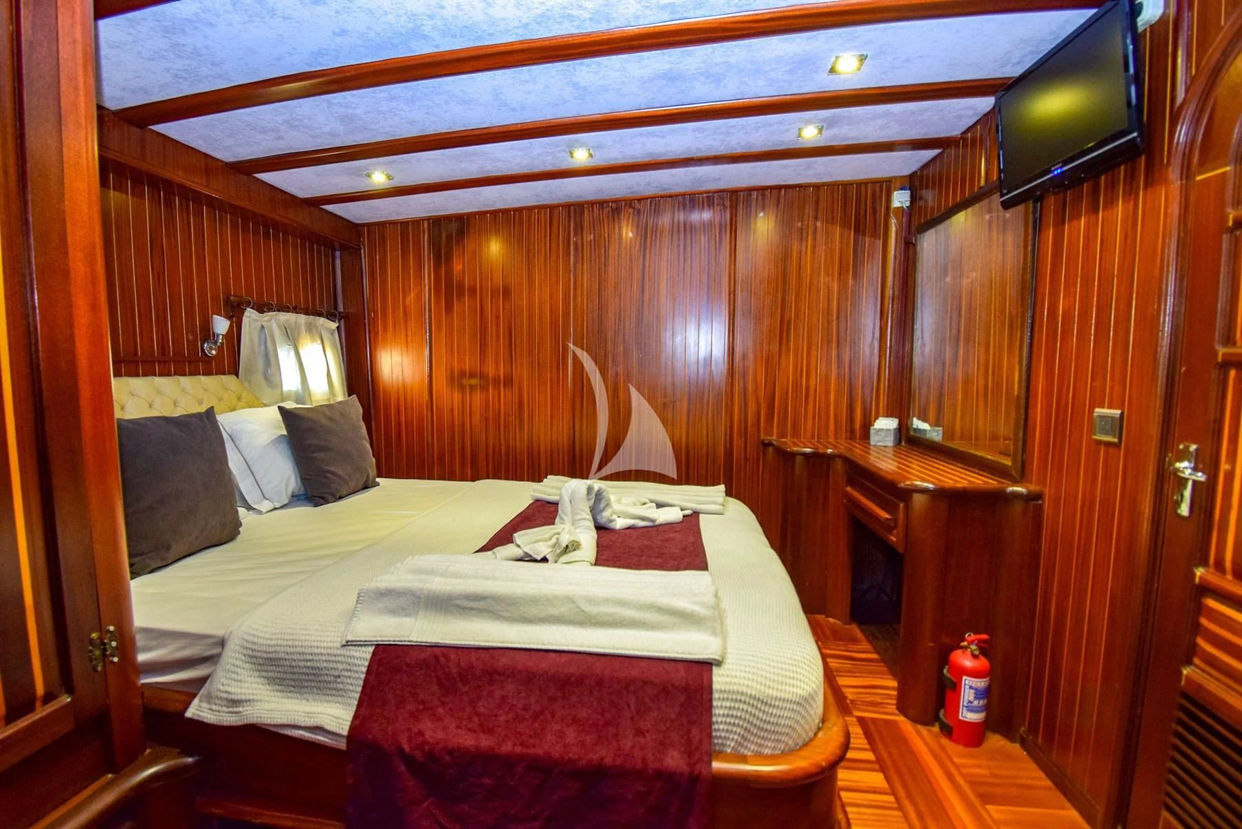 a bed in a cabin aboard UGUR Yacht for Sale