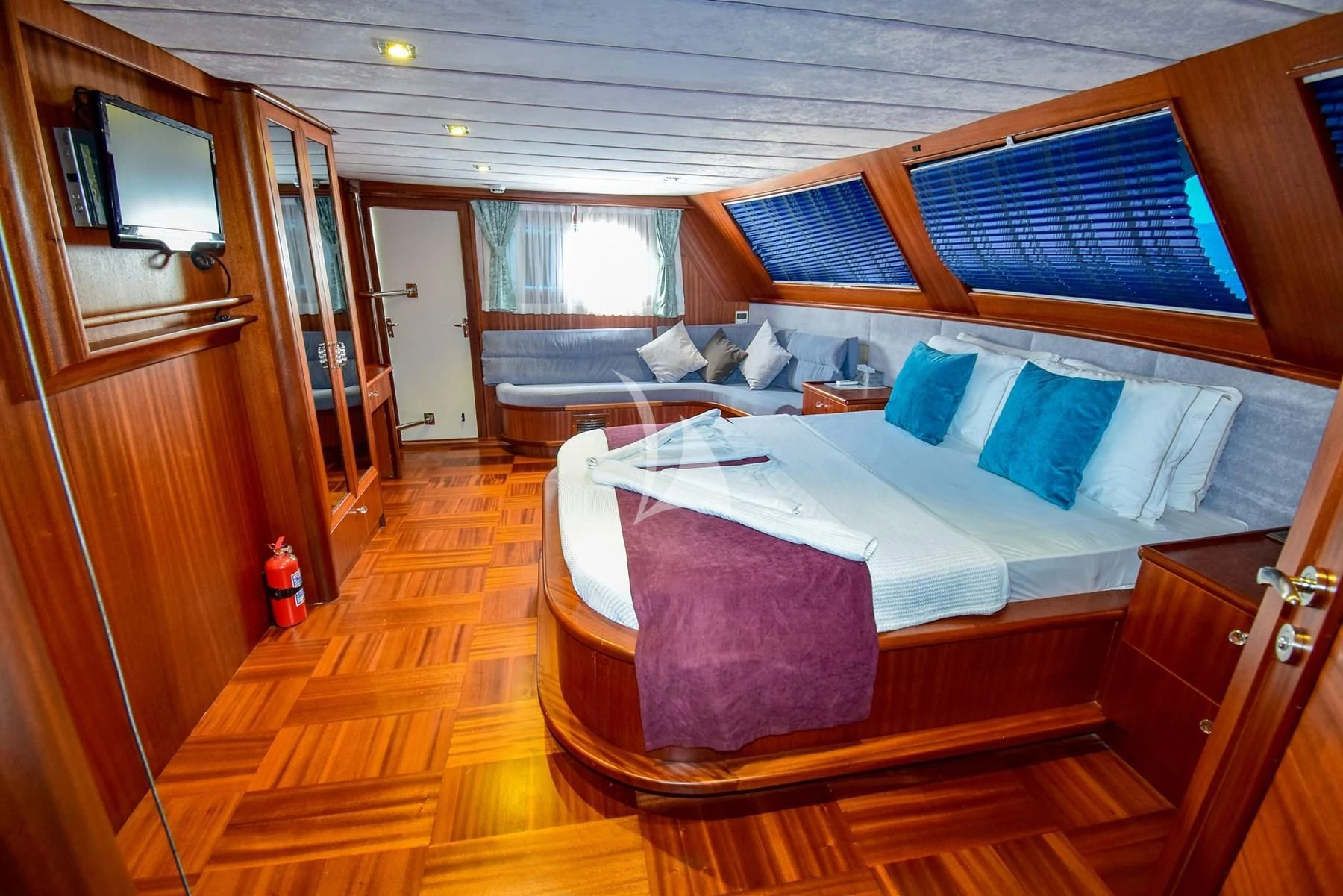 a bed in a room aboard UGUR Yacht for Sale