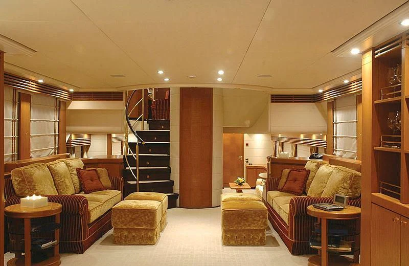 a living room with a staircase aboard ALFA XII Yacht for Sale