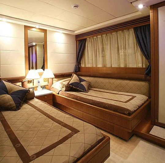 a hotel room with a bed aboard ALFA XII Yacht for Sale