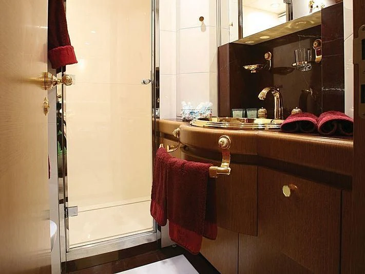 a bathroom with a sink and a mirror aboard ALFA XII Yacht for Sale