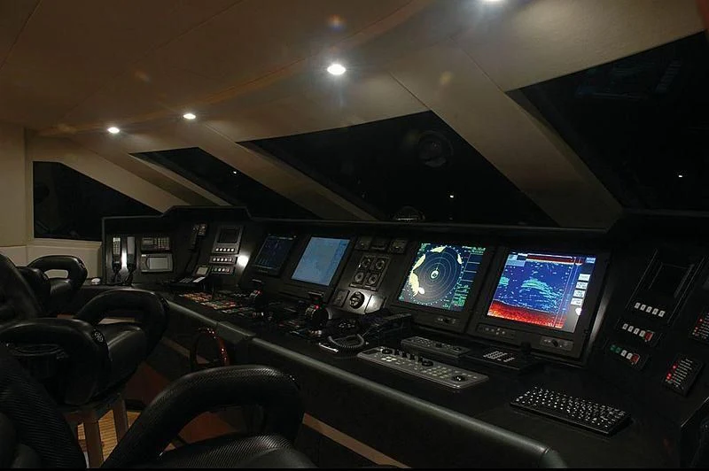 a control room with many monitors aboard ALFA XII Yacht for Sale