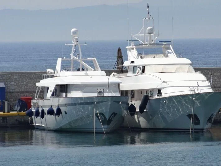 a couple of large white boats aboard LULLABY Yacht for Sale