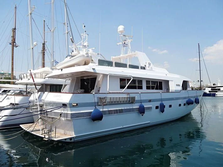 a white boat in the water aboard LULLABY Yacht for Sale