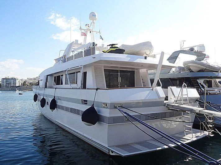 a white boat on the water aboard LULLABY Yacht for Sale