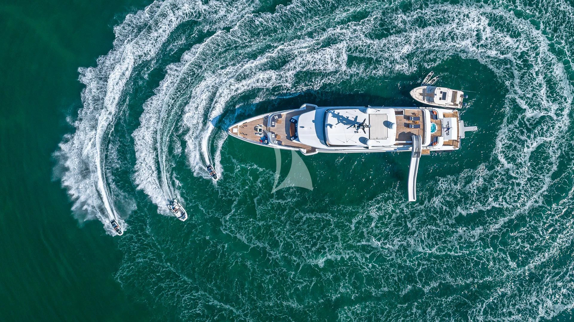 a plane flying over a sea aboard RISING DAWN Yacht for Sale