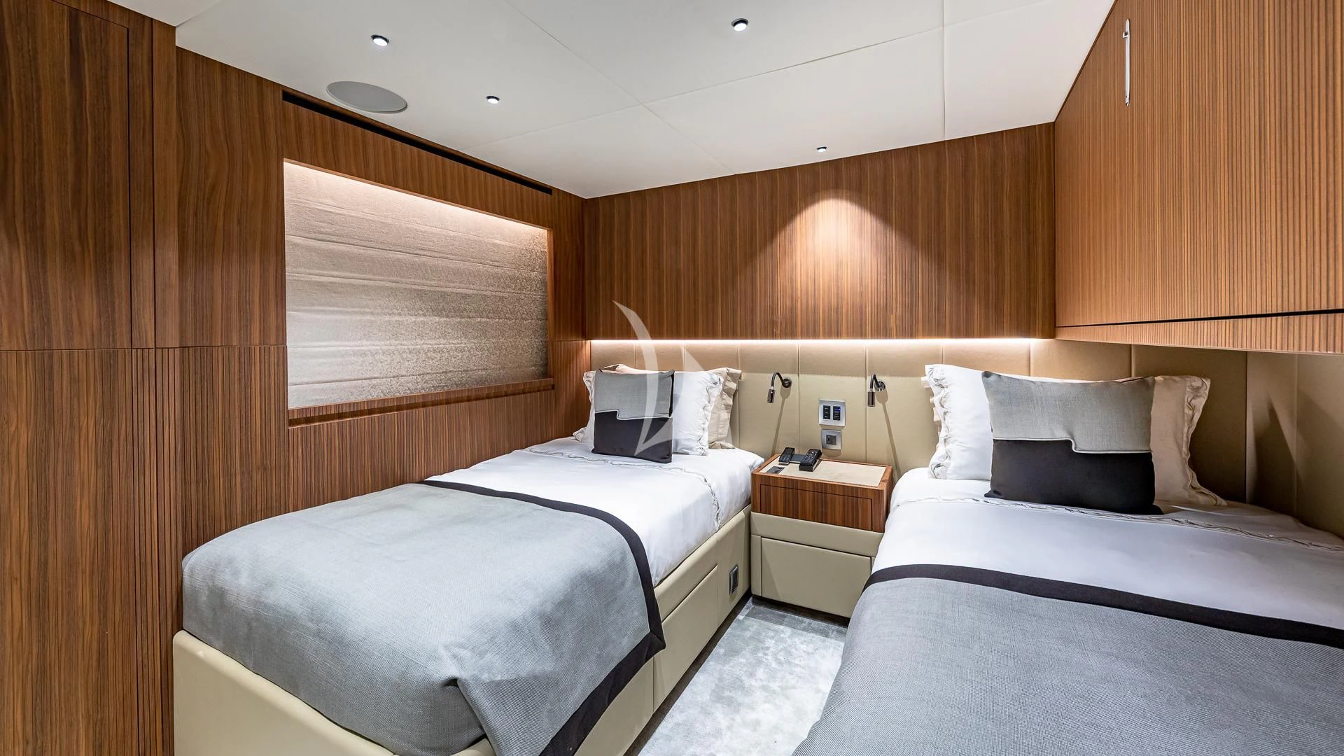 a room with two beds aboard RISING DAWN Yacht for Sale