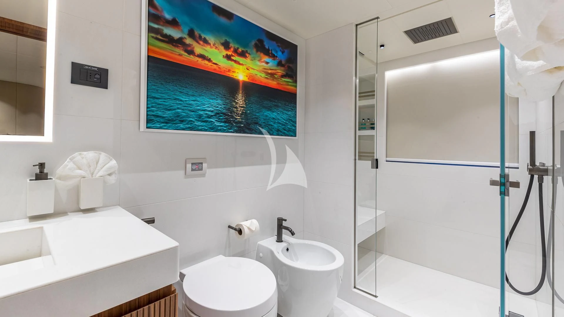 a bathroom with a glass shower aboard RISING DAWN Yacht for Sale