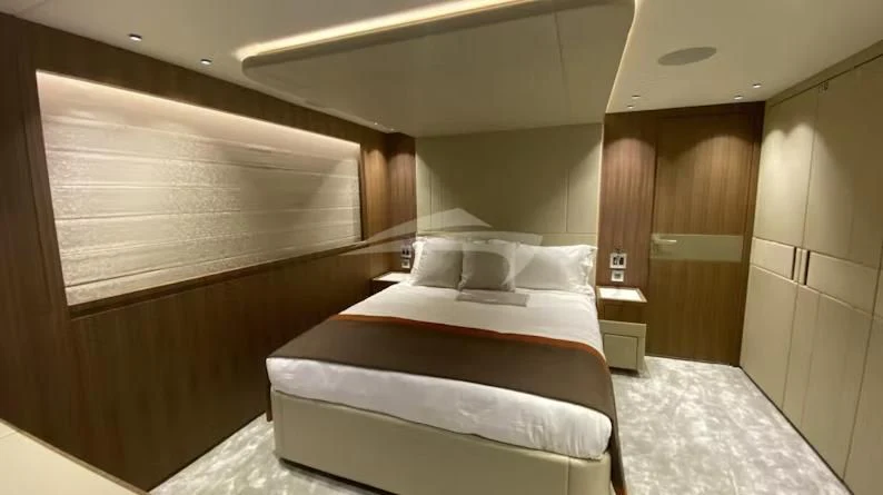 a room with two beds aboard RISING DAWN Yacht for Sale